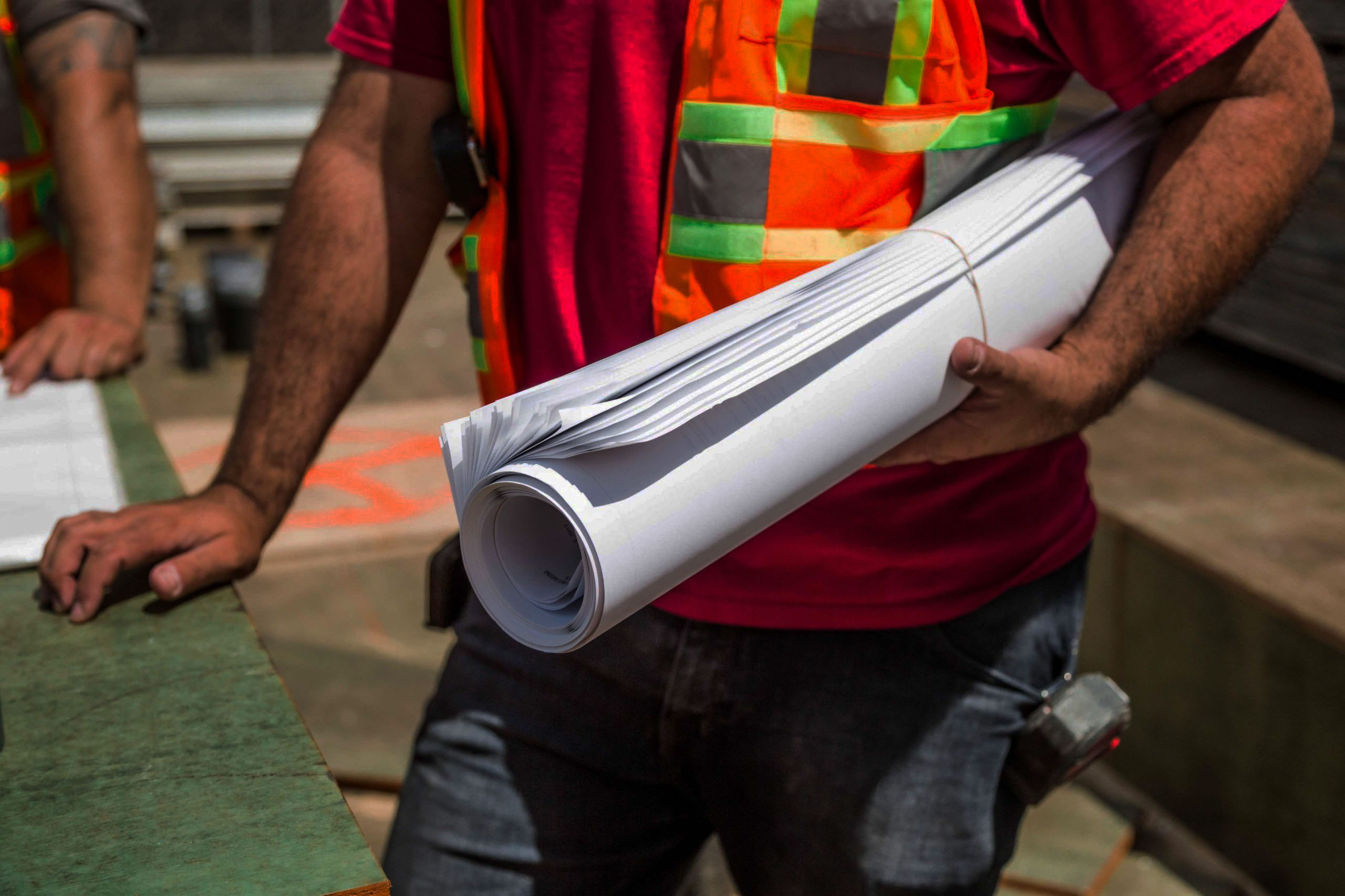 Construction Worker with Chart Plan
